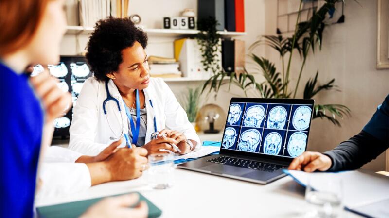 doctors studying mri results
