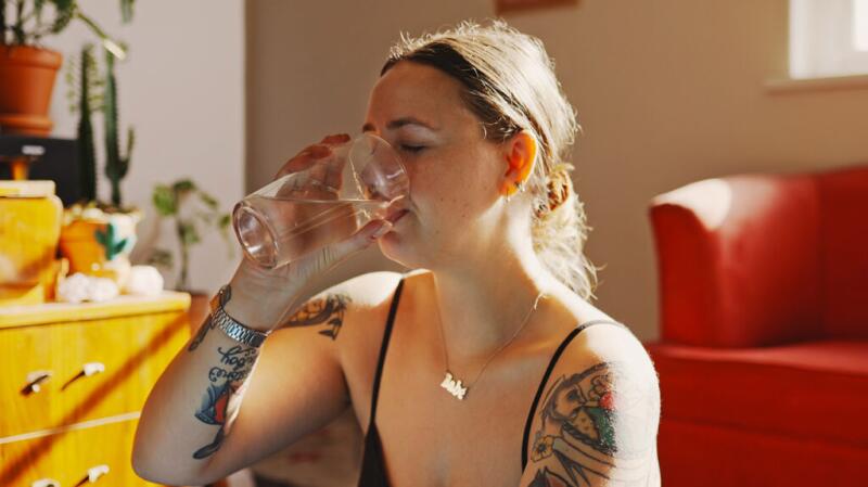 A woman drinking water