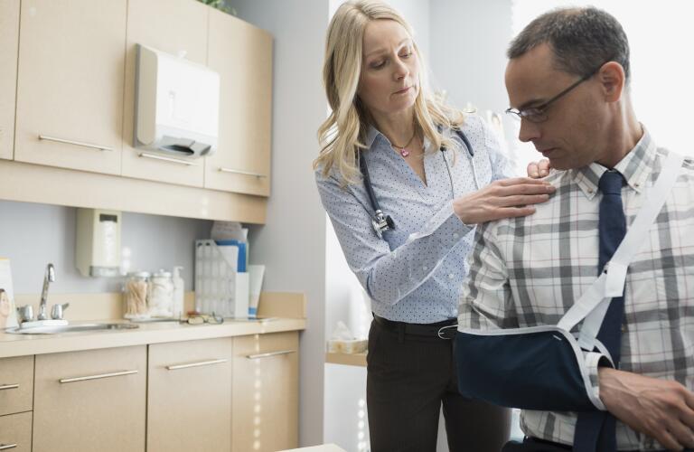 Patient in arm sling