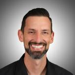Dr. Tanner Mackey, AuD