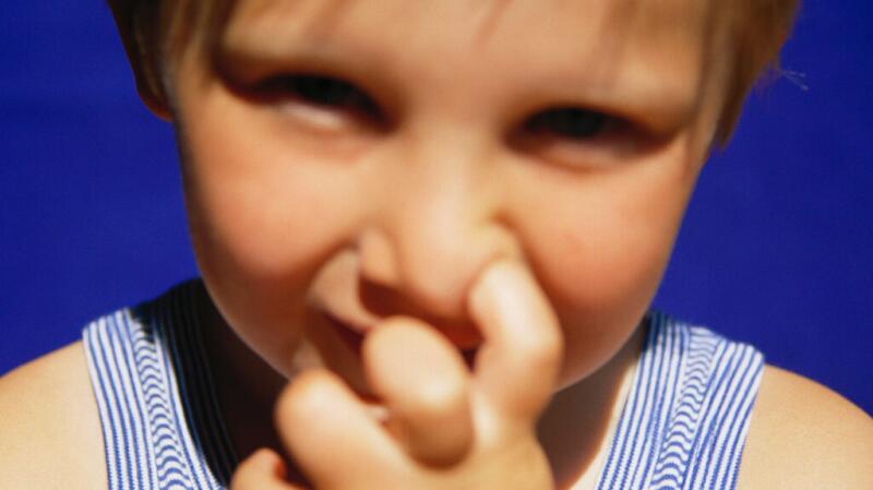 A child picking their nose