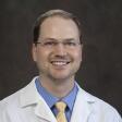 Dr. Daniel Warburton, MD