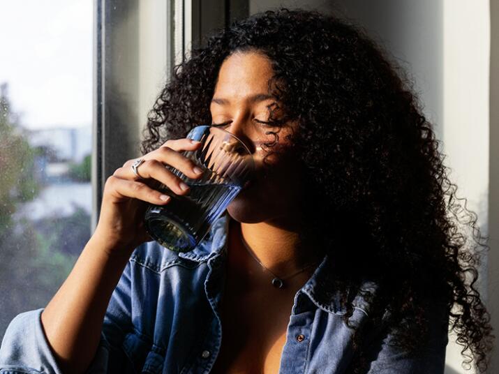 Woman drinking from a glass