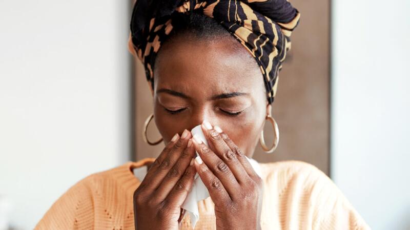 Person blowing their nose