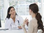 Female doctor discussing with a patient