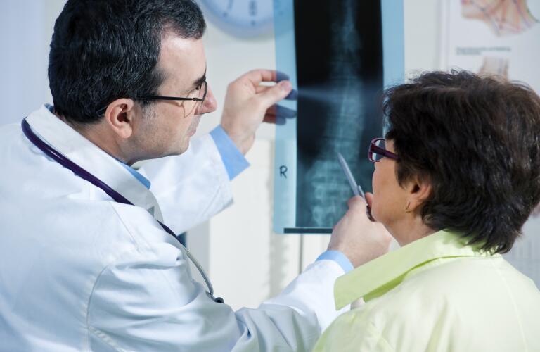 doctor-pointing-at-x-ray-of-back