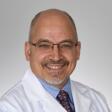 Photo: Dr. John Comisi, DDS