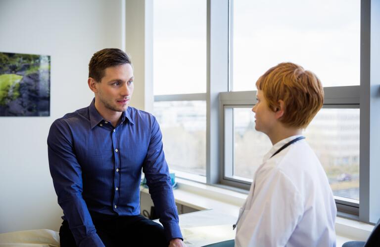 male talking to doctor