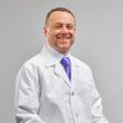 Photo: Dr. Alekander Komm, MD