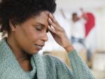 Middle age African American woman with headache, migraine, stress or fatigue