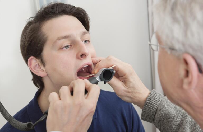 Throat Exam With Depressor