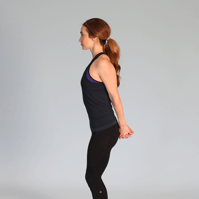 a woman is doing a backwards doorway stretch