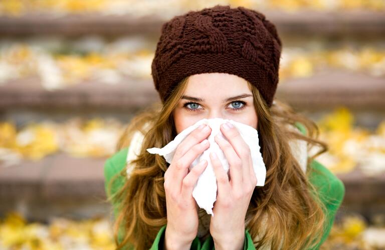 woman-blowing-nose