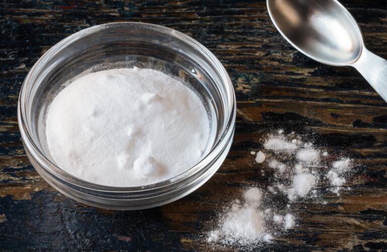 high angle of baking soda and measuring spoon