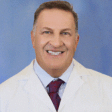 Dr. Ralph Breslaw, MD