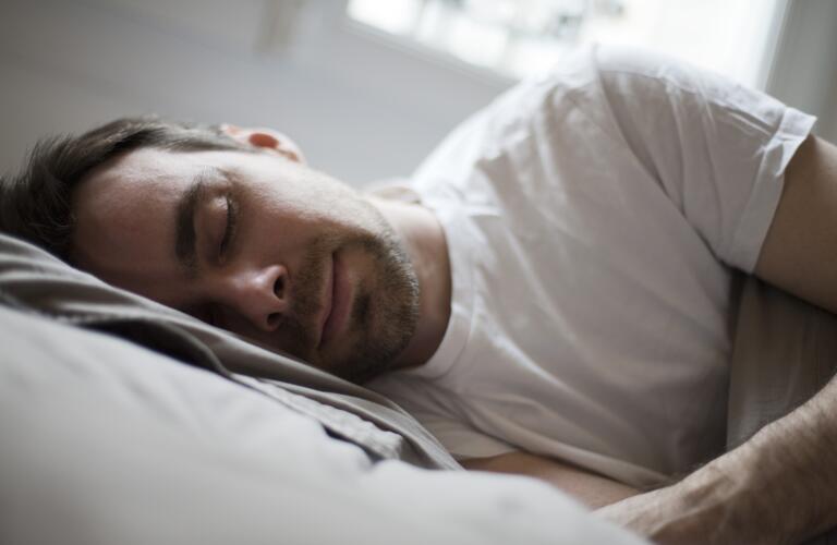 man-sleeping-on-side