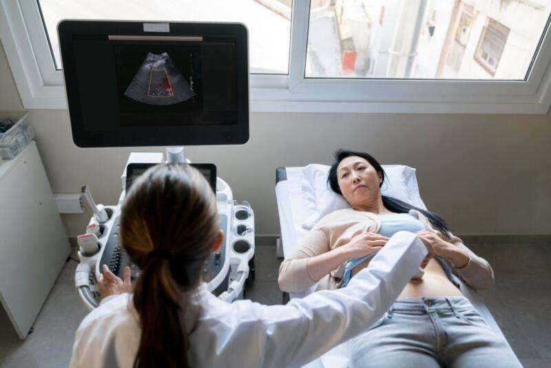 A person undergoing an abdominal ultrasound scan