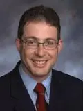 Image of Dr. Theuma