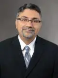 Image of Dr. Comar