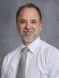 Image of Dr. Travis